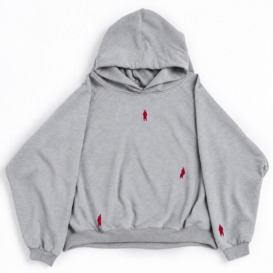 Hoodie gris FORMA, vista frontal con personitas bordadas en rojo
